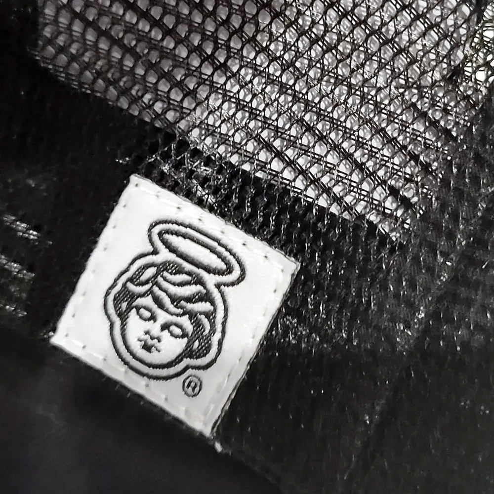 Photo of the haloed angel label inside the hat