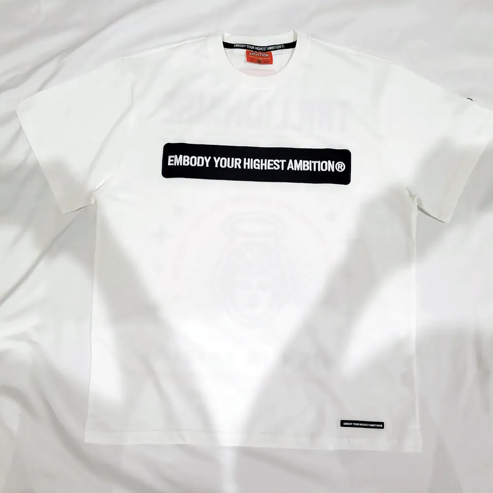 Photo of the tee laid flat, front
